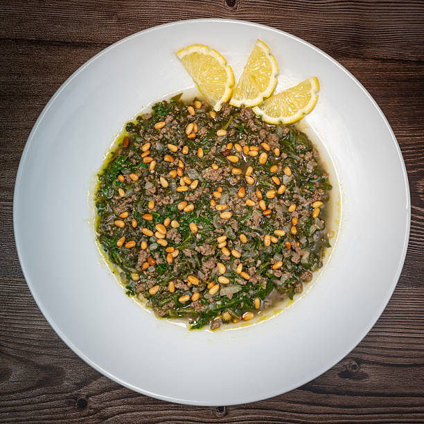 istock Spinach or Sabanekh with chicken a Mediterranean dish served with rice 2234853114