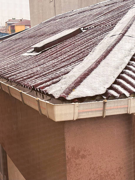 istock A Light Dusting of Snow on an Old Roof 2234853791