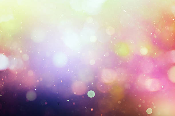 istock rainbow bokeh with floating defocused particles, christmas lights,  magic, fantasy, wonder 2234854535