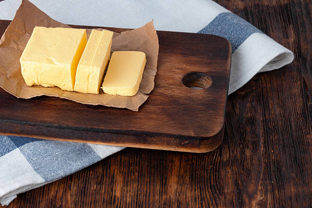 istock Cut butter on plate with blue towel on kitchen table 2234856968