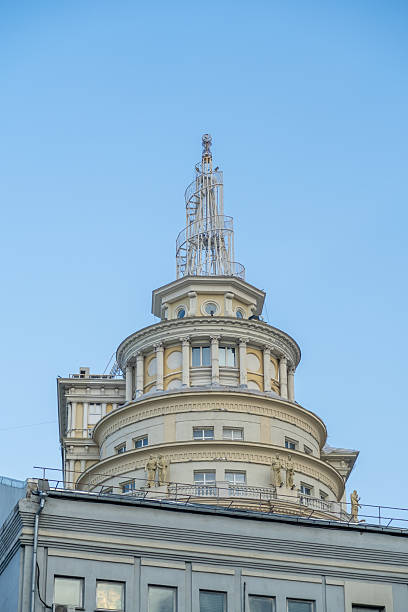 istock Historic Skyscraper With Ornate Top Architecture Against a Clear Blue Sky During Sunset in an Urban Landscape 2234860846