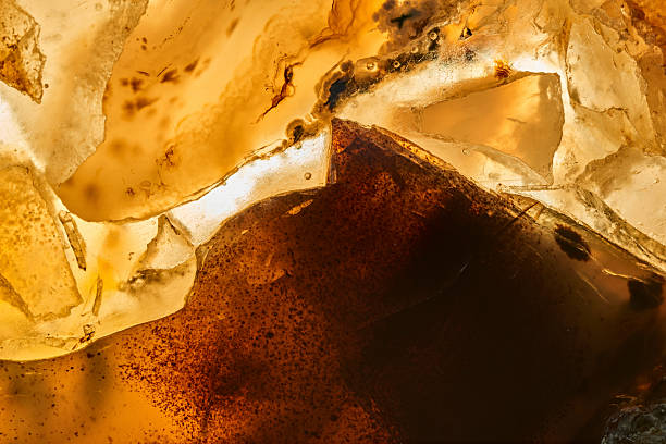 Agate macro detail. close-up of a textured semi-precious gemstone background. backlight transparency