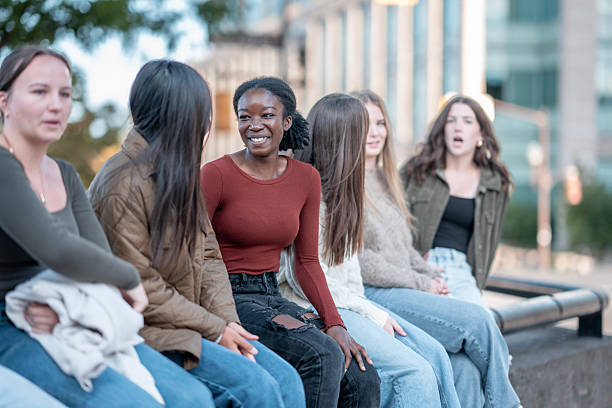 istock Diverse Group of Friends Socializing Outdoors in Urban Setting 2234863266