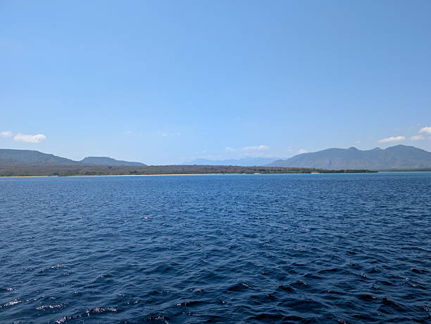 istock Blue Sea View and Mountains under Clear Sky 2234863829