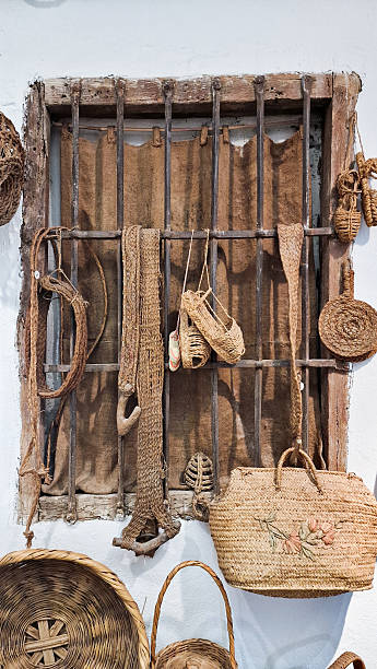 istock Rustic window display featuring woven baskets and handmade textiles, showcasing traditional craftsmanship and natural materials in a charming, artistic arrangement 2234864936