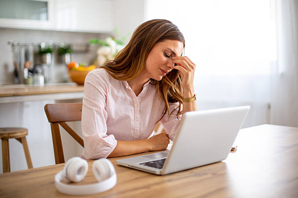 istock Businesswoman feeling stressed while working remotely from home 2234866346