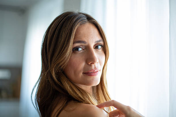 istock Beautiful woman posing near window with natural light 2234866729