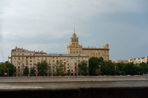 Night view on Moscva river with one of the Seven Sisters Stalinist skyscrapers