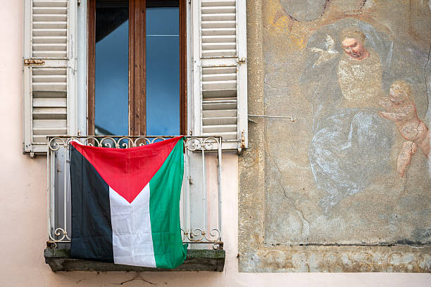 Palestine flag outside italian window
