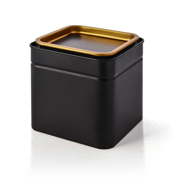 Black metal container for tea or coffee isolated on white