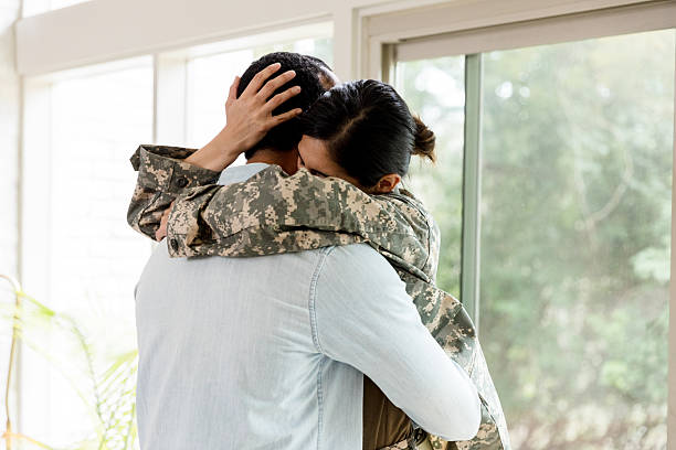 istock Tender Embrace: Military Reunion, Love and Support 2234876826