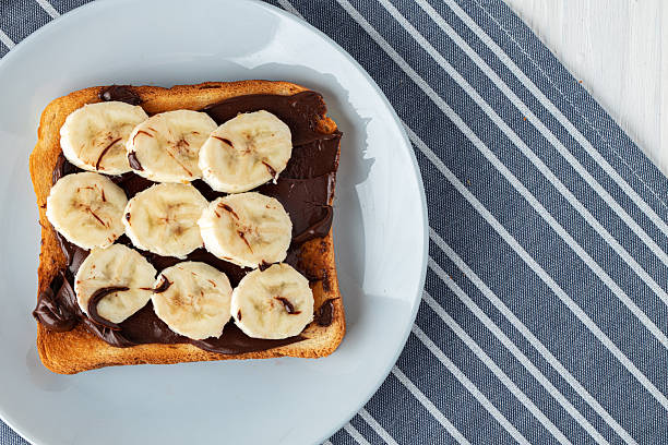 istock Fried toast with chocolate paste and banana slices 2234879126