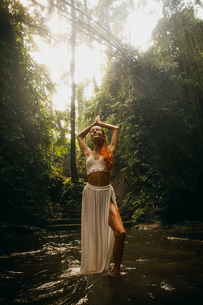 istock Serene yoga practice in tranquil jungle setting with natural sunlight 2234884966