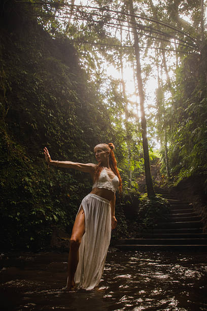 istock Woman in a serene jungle setting showcasing grace and tranquility 2234885128