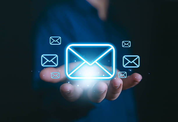 istock Digital email communication concept with glowing envelope icons, representing business messaging, online communication, email marketing, and modern technology for global connectivity. 2234886546