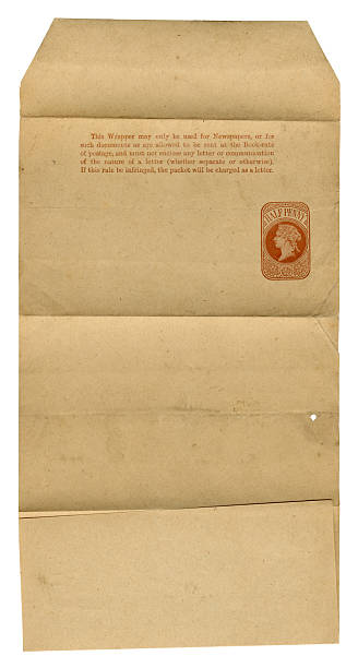istock Old newspaper wrapper with Queen Victoria halfpenny printed stamp 2234889235