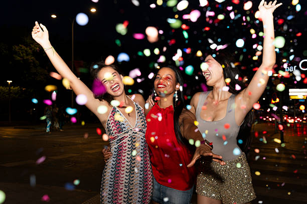 istock Three women celebrating at night 2234894463