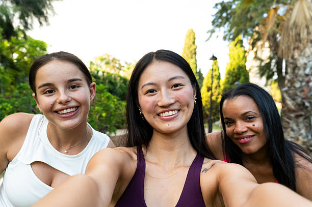 istock Three young women taking a selfie in the park after exercising 2234897678