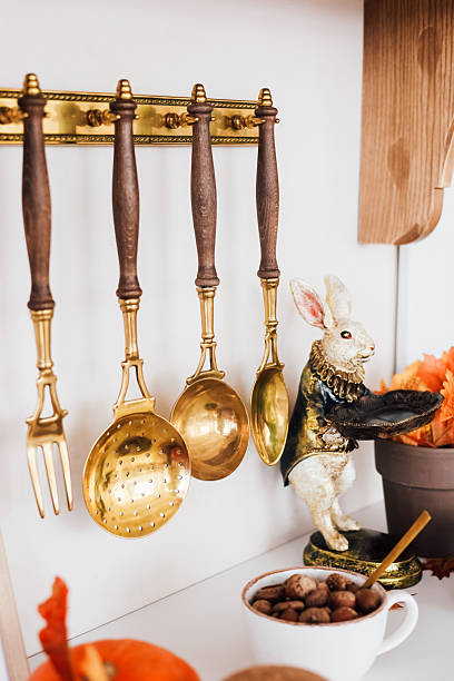 istock Decorative kitchen arrangement with vintage utensils and a charming rabbit figurine 2234905736