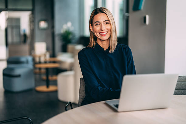 istock A successful businesswoman is using a laptop and working in the office 2234907728