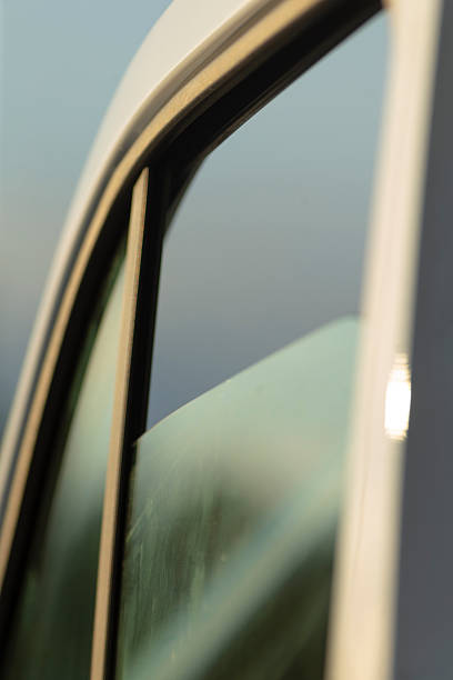 istock A CloseUp of a Car Window Frame Highlighting Its Reflection and Details 2234912020