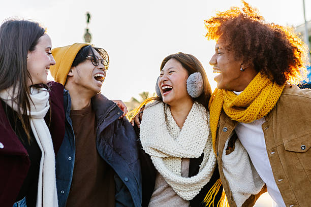 istock Diverse group of young friends having fun together outdoors on winter 2234913062