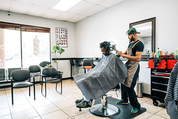 istock Barber working on client's hair 2234916242