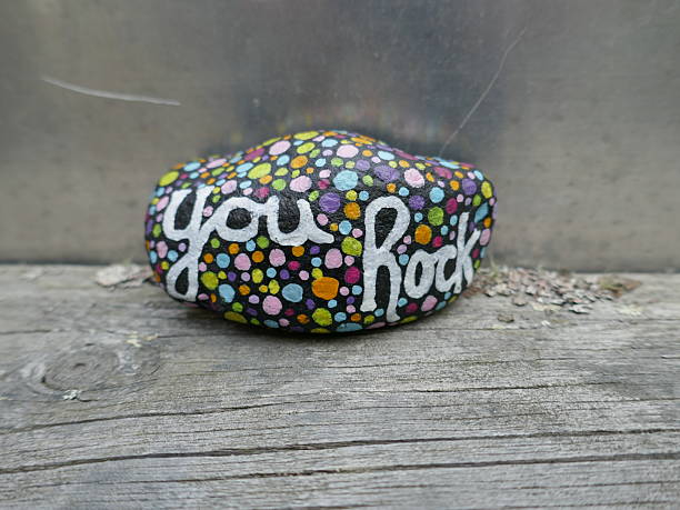 istock You rock kindness rock on wooden ledge 2234916265