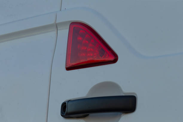 istock The Rear Light and Handle feature of a White Van utilized for driving 2234916814