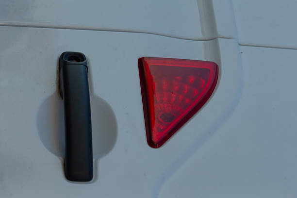 istock The vehicle features a red taillight and a door handle for functionality 2234917504