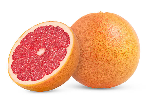 istock Juicy whole grapefruit and cut in a half isolated. Halved grapefruit. Grapefruit cut and whole grapefruit. 2234920220