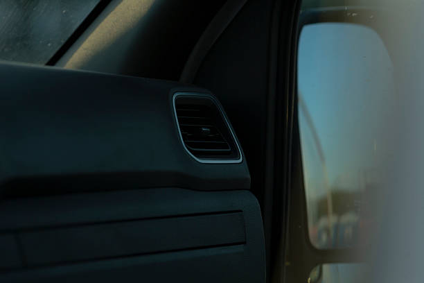 istock Image showing a car interior with the reflection of a side mirror 2234920738