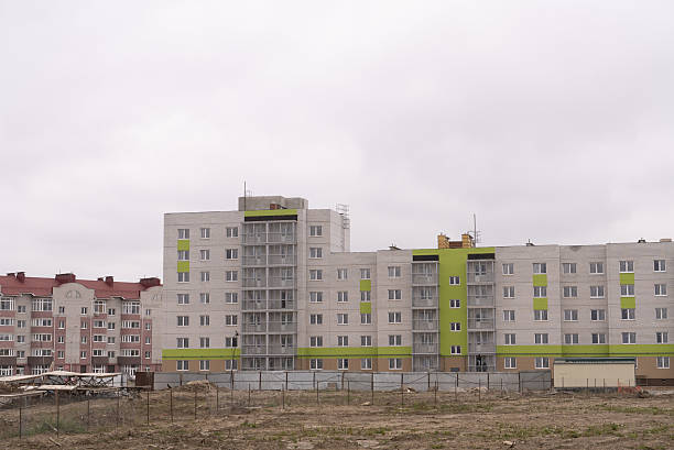 istock The ongoing development of modern buildings at the construction site is a vital task in progress. A construction site showcasing the ongoing development of modern residential buildings and facilities 2234920844