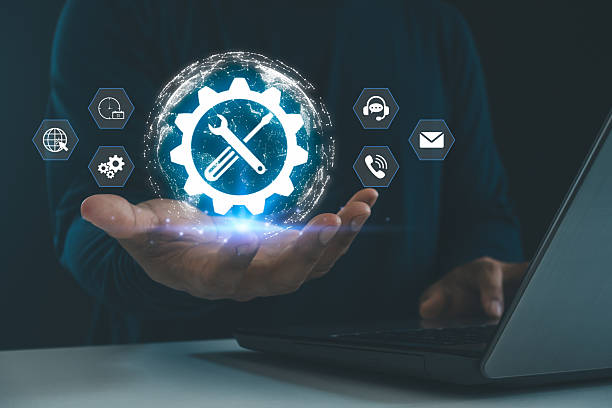 istock Innovative concept of IT support and digital tools with a gear and wrench icon, technical support, system maintenance, software updates and customer service technology in modern business environment.. 2234921562