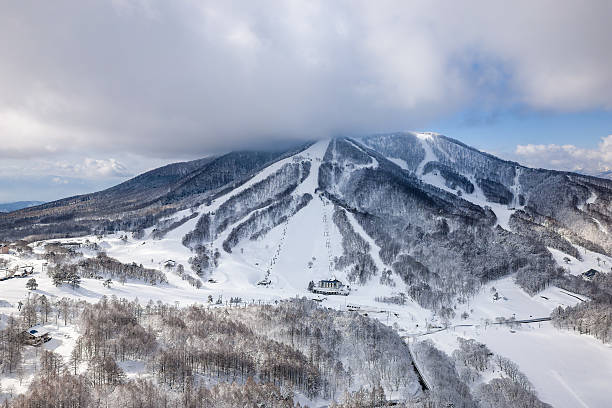istock Snowy Mountain Slopes and Forest in Winter, Japan 2234922217