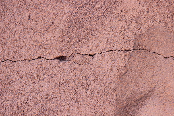 A close up of a cracked wall