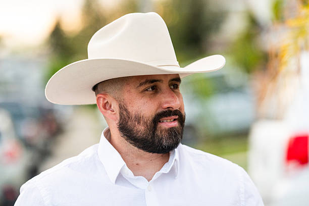 istock Hispanic man posing wearing a cowboy looking away 2234935198