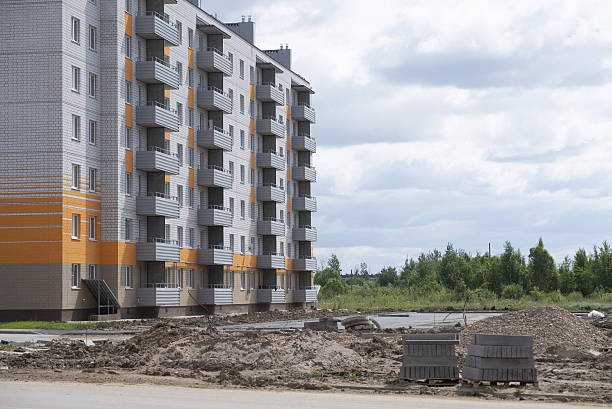 istock The ongoing development of modern buildings at the construction site is a vital task in progress. A construction site showcasing the ongoing development of modern residential buildings and facilities 2234935238