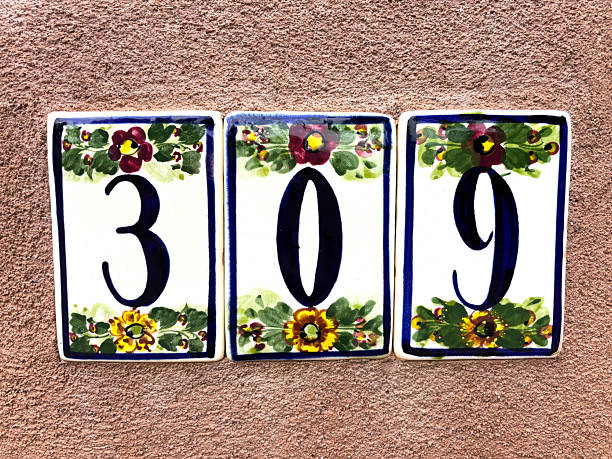 istock Ceramic Number 309 Street Address Tiles, Tan Wall 2234936025
