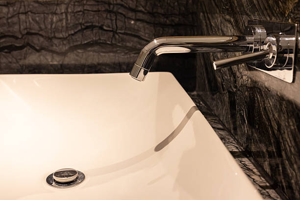 istock New hotel modern water sink in bathroom interior. Space for text 2234936283