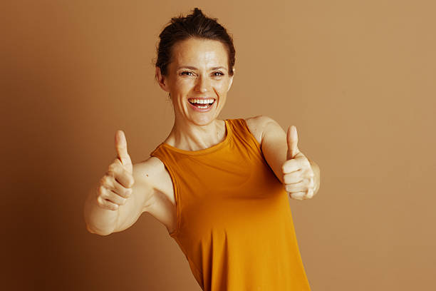 istock Broad Smile, Double Thumbs Up: Mature Woman 2234944026