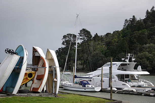 A variety of different boats in an estuary scene in Auckland New Zealand