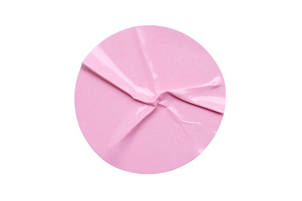 istock Blank pink round adhesive paper sticker label isolated on white background 2234948641