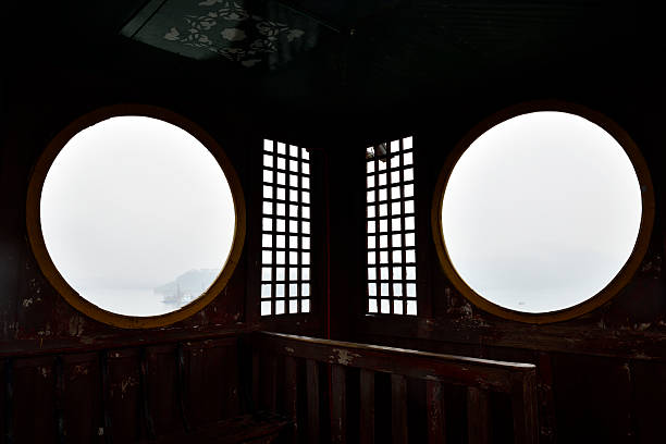 Traditional log windows at Shibaozhai Scenic Area, Zhong County, Chongqing, China.