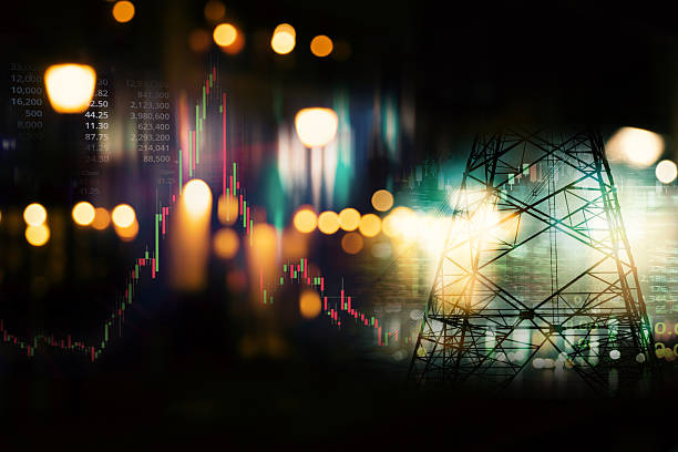 istock electric tower with stock market graph background 2234954471