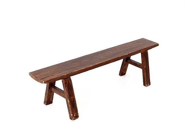 The white background in the picture is a multipurpose decorative chair with a curved black steel frame with a beautiful, strong pattern. There is a colorful wooden board as a stand.