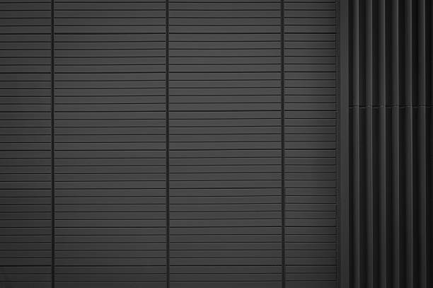 istock Black corrugated metal sheet wall texture background 2234963985