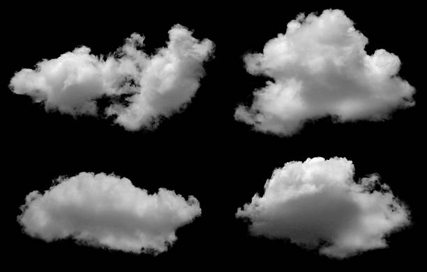 istock Realistic white fluffy clouds isolated on black background, perfect for graphic design, photo montage, sky replacement, creative artwork, digital projects, and nature concept illustrations. 2234965029