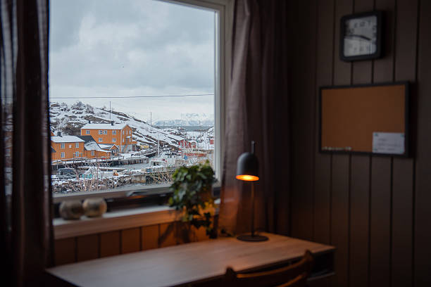 Cozy Desk with Snowy Town View