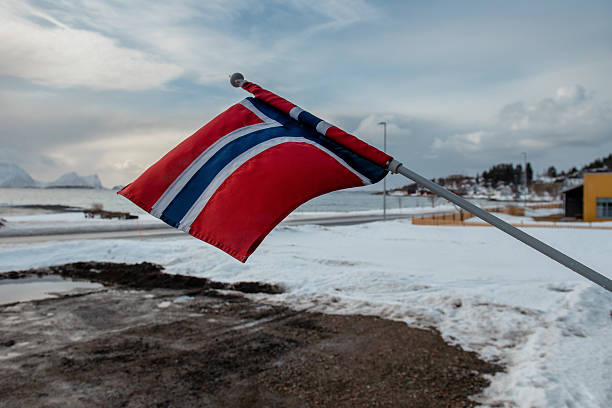 istock Norwegian Flag in Snowy Landscape 2234969536